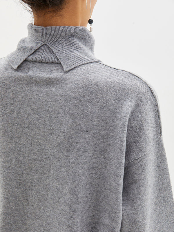 curved hem turtleneck knit