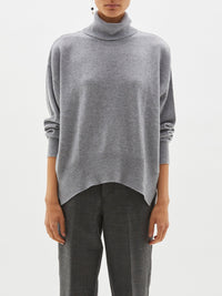 curved hem turtleneck knit