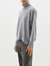 curved hem turtleneck knit